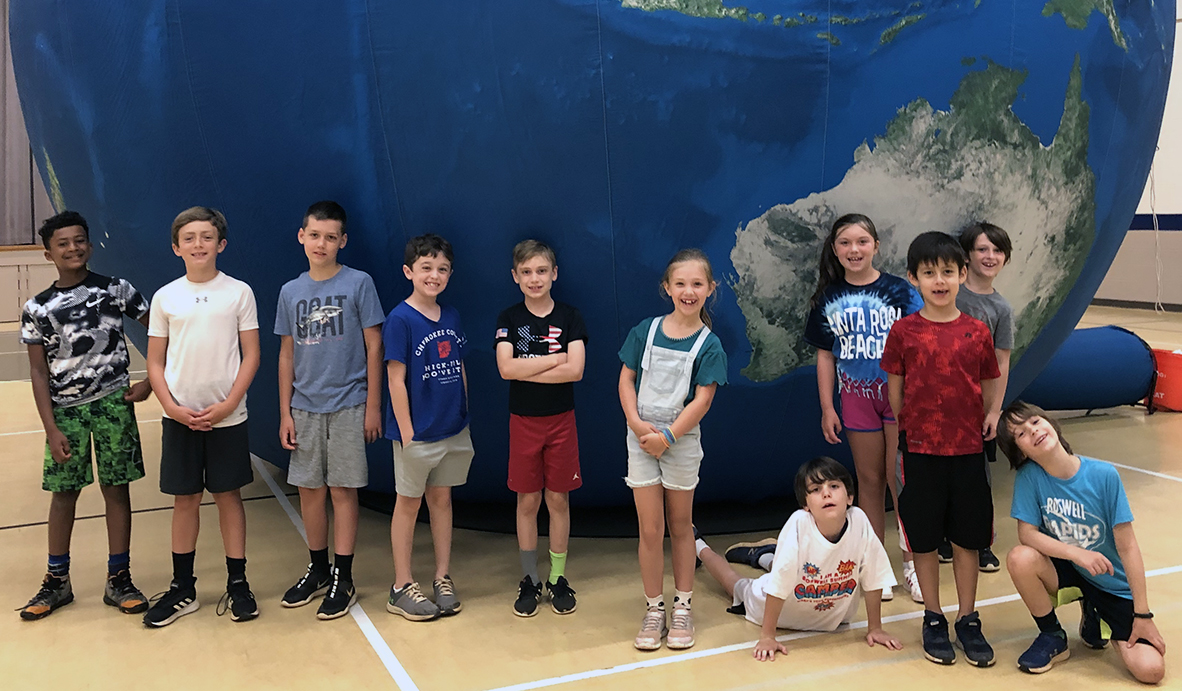 2020 Roswell Summer Day Camp participants and the Earth Balloon the city uses in its environmental education efforts.