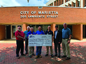 City of Marietta receives a check from the Home Depot. 