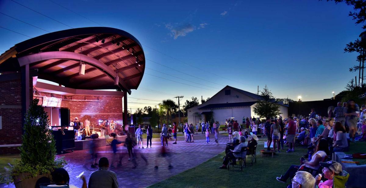 First Friday concert held in the Ritz Amphitheater. The amphitheater was conceived out a charrette for the Creative District area, and since opening has continued to grow in popularity regionally. For