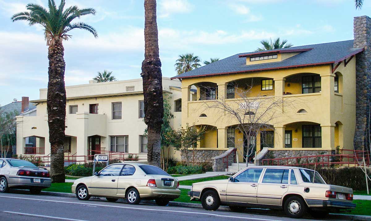  The development of missing middle housing types like these Arizona four-plexes, which often have no off-street parking, become much more feasible with parking reform. Source: Opticos Design