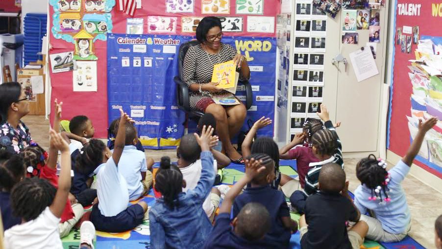 East Point Mayor Deana Holiday Ingraham reads to students during the 2019 Georgia Pre-K Week.