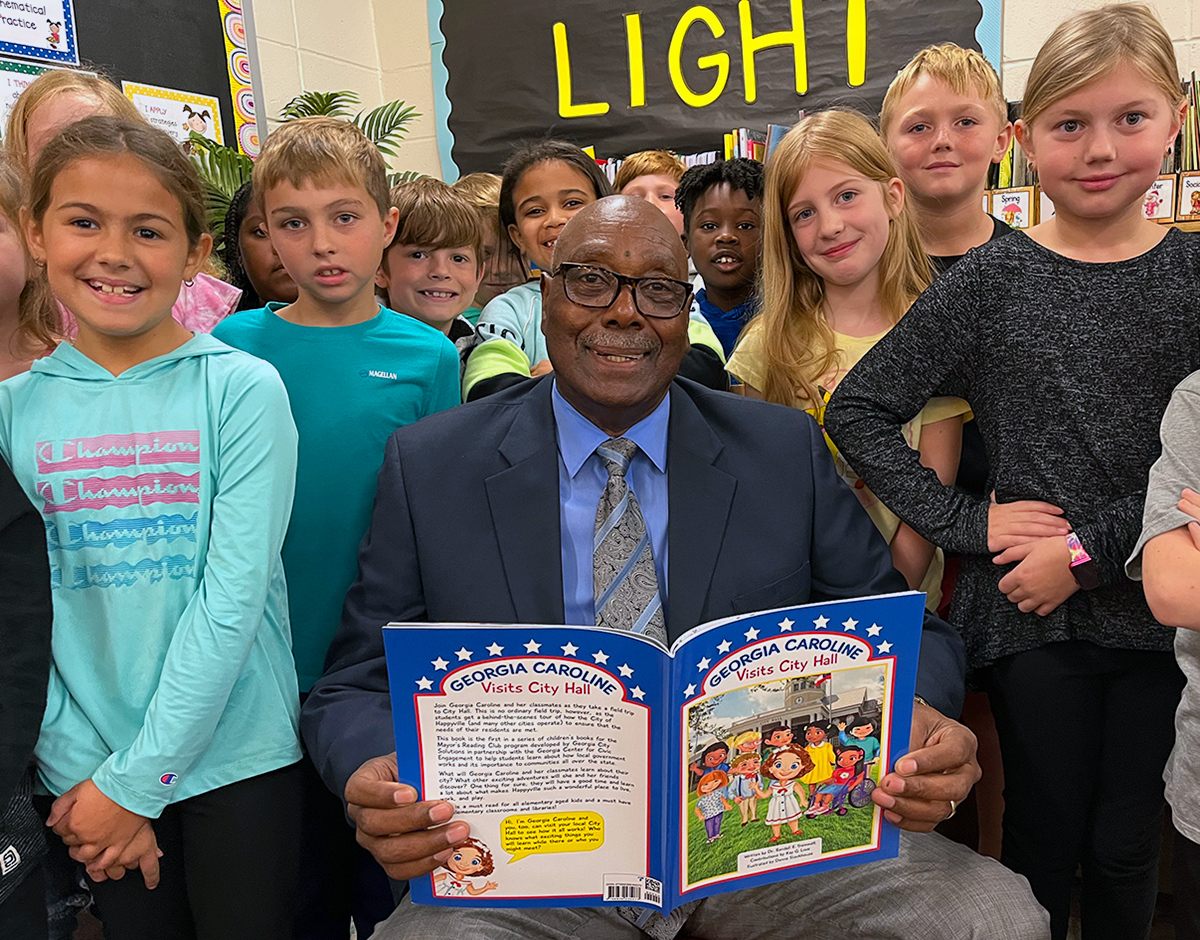 Madison Mayor Fred Perriman reads to third graders at Morgan County Elementary School, October 2022. Photo: Patrick Yost.